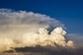 Storm clouds bathed in sunset light Royalty Free Stock Photo