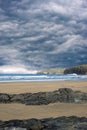 Storm clouds with beach waves Royalty Free Stock Photo