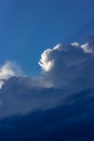 storm clouds blue sky sun beam Royalty Free Stock Photo