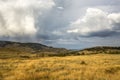 Storm clouds on colorful fields of Yellowstone Park, Wyoming. Royalty Free Stock Photo