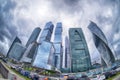 The storm clouds floating over the skyscrapers of the Moscow International Business Center (Moscow-City). Fisheye