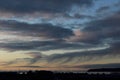 Storm clouds move in the sky over Semiahmoo Bay at sunset Royalty Free Stock Photo