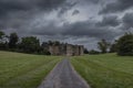 Storm clouds over Calke Abbey in Derbyshire