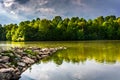 Storm clouds over Centennial Lake, at Centennial Park, in Columbia, Maryland. Royalty Free Stock Photo