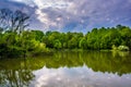 Storm clouds over Centennial Lake, at Centennial Park in Columbia, Maryland. Royalty Free Stock Photo