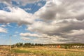 Rain clouds over the city, storm clouds over the field Royalty Free Stock Photo