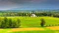 Storm clouds over fields and distant mountains seen from Longstreet Observation Tower in Gettysburg, Pennsylvania. Royalty Free Stock Photo