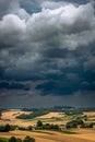 Storm clouds over hills and farmland. Roztocze, Poland Royalty Free Stock Photo