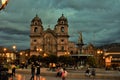 Cusco Plaza de Armas and Pachacutec, tourists and nightfall