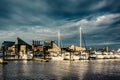 Storm clouds over a marina at the Inner Harbor, Baltimore, Maryland. Royalty Free Stock Photo
