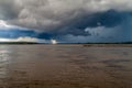 Storm clouds over river Napo