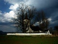 Storm clouds over rural church Royalty Free Stock Photo