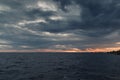 Storm clouds over the sea at sunset. Seascape. Beautiful view of the sea and sunset Royalty Free Stock Photo