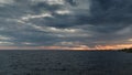 Storm clouds over the sea at sunset. Seascape. Beautiful view of the sea and sunset. Beautiful nature landscape with dramatic clou Royalty Free Stock Photo