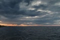 Storm clouds over the sea at sunset. Seascape. Beautiful view of the sea and sunset. Beautiful nature landscape Royalty Free Stock Photo