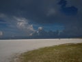Storm clouds over Siesta Key Beach Florida at dawn. Mimimalist background image Royalty Free Stock Photo