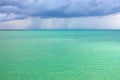 Storm clouds over the turquoise sea Royalty Free Stock Photo