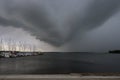Storm clouds over the yacht harbor in the Salzhaff of Rerik at the Baltic Sea Mecklenburg-Vorpommern, Germany, copy space, Royalty Free Stock Photo
