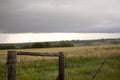 Storm Clouds Prairie Sky Fence Royalty Free Stock Photo