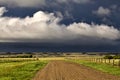 Storm Clouds Prairie Sky Gravel Road Royalty Free Stock Photo