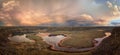 Storm clouds and rainbow over dry falls lake panorama  grant county perch lake rainbow lake near coulee city and basalt cliffs Royalty Free Stock Photo
