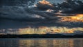 Rainy sunset over the lake Royalty Free Stock Photo