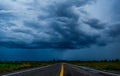 Storm clouds sky background over the highway in countryside landscape of Thailand. Royalty Free Stock Photo