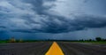 Storm clouds sky  background over the highway in countryside landscape of Thailand. Royalty Free Stock Photo