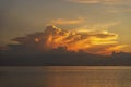 Storm clouds during sunset.Colorful sunset over calm sea water near tropical beach. Summer vacation concept. Island Phangan, Royalty Free Stock Photo