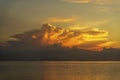 Storm clouds during sunset.Colorful sunset over calm sea water near tropical beach. Summer vacation concept. Island Phangan, Royalty Free Stock Photo