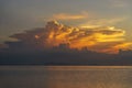 Storm clouds during sunset.Colorful sunset over calm sea water near tropical beach. Summer vacation concept. Island Phangan, Royalty Free Stock Photo