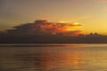 Storm clouds during sunset.Colorful sunset over calm sea water near tropical beach. Summer vacation concept. Island Phangan, Royalty Free Stock Photo