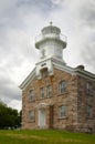 Storm Clouds Surround Great Captain Island Lighthouse in Connecticut Royalty Free Stock Photo