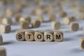 Storm - cube with letters, sign with wooden cubes