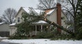 Storm Damage: Tree Crashes Through House Roof, Winter Scene Royalty Free Stock Photo