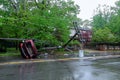 Storm damaged electric pole car turned over after accident