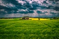 Storm dark clouds over field Royalty Free Stock Photo