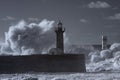 Storm at the Douro mouth north beacon and pier