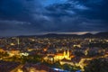Storm with dramatic clouds over the city of Graz, with Mariahilfer church and historic buildings, in Styria region, Austria Royalty Free Stock Photo