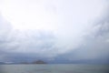 Storm dramatic clouds over the surface of the sea Royalty Free Stock Photo