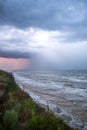 Storm front over water with wall of rain Royalty Free Stock Photo