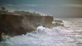 Storm ocean hitting rocky coastline. Powerful waves splashing making explosion Royalty Free Stock Photo