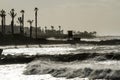 Stormy sunny day at a harborwalk Royalty Free Stock Photo