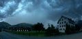 Storm over farmhouse in the Swiss village of Berschis Royalty Free Stock Photo