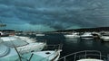 The storm over the harbor with yachts Royalty Free Stock Photo