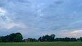 A storm rages on the horizon with heavy rain and thunderstorms