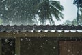 Storm rain on the roof of the house Royalty Free Stock Photo