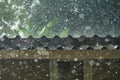 Storm rain on the roof of the house Royalty Free Stock Photo