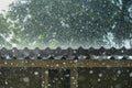 Storm rain on the roof of the house Royalty Free Stock Photo