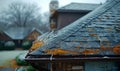 After the Storm: Raindrops and Hail on a Suburban Roof. Generative ai Royalty Free Stock Photo